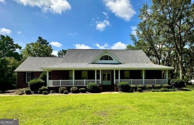 Imagine mornings on your spacious covered front porch or on Okefenokee Country Club in Georgia - for sale on GolfHomes.com, golf home, golf lot