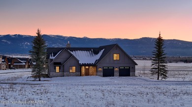 Refined Elegance Joins Nature's Doorstep. Set within one of the on Teton Reserve in Idaho - for sale on GolfHomes.com, golf home, golf lot