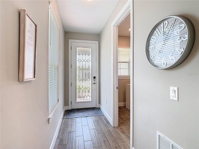 HUGE LIST PRICE decrease for this exquisitely maintained 2023 on Stonegate Golf Club in Florida - for sale on GolfHomes.com, golf home, golf lot