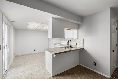 Updated and open 2 bedroom, 2 bath loft style townhome right on on Golf Club At Heather Ridge in Colorado - for sale on GolfHomes.com, golf home, golf lot