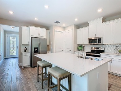 HUGE LIST PRICE decrease for this exquisitely maintained 2023 on Stonegate Golf Club in Florida - for sale on GolfHomes.com, golf home, golf lot