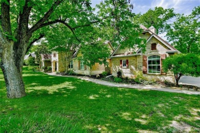 This exceptional residence in Pecan Plantation, is a stone and on Pecan Plantation Country Club in Texas - for sale on GolfHomes.com, golf home, golf lot