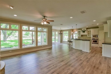 This exceptional residence in Pecan Plantation, is a stone and on Pecan Plantation Country Club in Texas - for sale on GolfHomes.com, golf home, golf lot