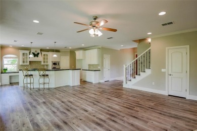 This exceptional residence in Pecan Plantation, is a stone and on Pecan Plantation Country Club in Texas - for sale on GolfHomes.com, golf home, golf lot