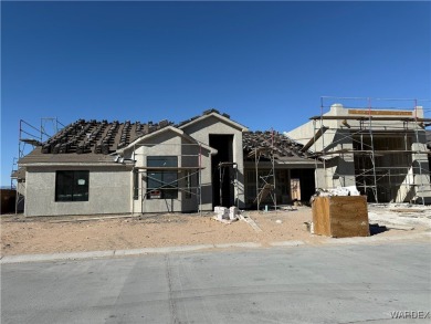When completed this new custom home will be the *Flamingo* Model on Desert Lakes Golf Course in Arizona - for sale on GolfHomes.com, golf home, golf lot