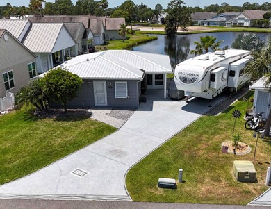 Check out this one-of-a-kind 900 sq.ft. premier suite with RV on The Great Outdoors Golf and Country Club in Florida - for sale on GolfHomes.com, golf home, golf lot