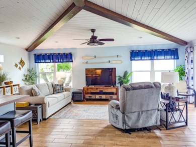 Check out this one-of-a-kind 900 sq.ft. premier suite with RV on The Great Outdoors Golf and Country Club in Florida - for sale on GolfHomes.com, golf home, golf lot