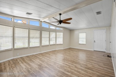 Beautiful updated manufactured home in Barefoot Bay. New roof in on Barefoot Bay Golf Course in Florida - for sale on GolfHomes.com, golf home, golf lot