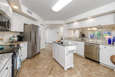 Welcome to this light and bright corner condo-home featuring an on East Bay Golf Club in Florida - for sale on GolfHomes.com, golf home, golf lot