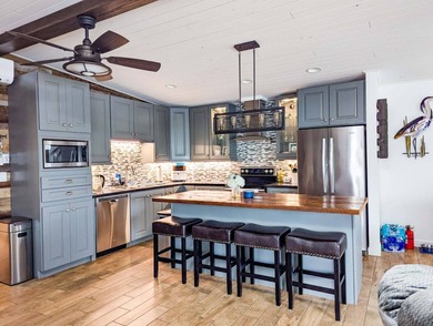 Check out this one-of-a-kind 900 sq.ft. premier suite with RV on The Great Outdoors Golf and Country Club in Florida - for sale on GolfHomes.com, golf home, golf lot