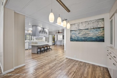 Beautiful updated manufactured home in Barefoot Bay. New roof in on Barefoot Bay Golf Course in Florida - for sale on GolfHomes.com, golf home, golf lot