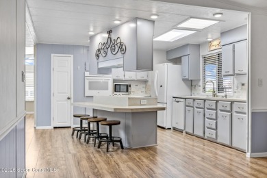 Beautiful updated manufactured home in Barefoot Bay. New roof in on Barefoot Bay Golf Course in Florida - for sale on GolfHomes.com, golf home, golf lot
