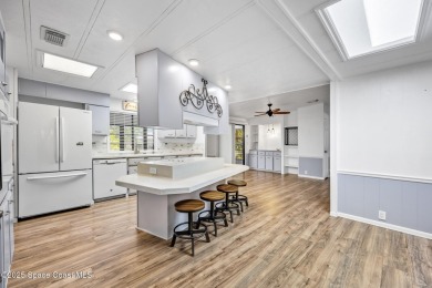 Beautiful updated manufactured home in Barefoot Bay. New roof in on Barefoot Bay Golf Course in Florida - for sale on GolfHomes.com, golf home, golf lot
