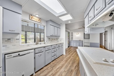 Beautiful updated manufactured home in Barefoot Bay. New roof in on Barefoot Bay Golf Course in Florida - for sale on GolfHomes.com, golf home, golf lot