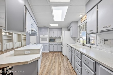 Beautiful updated manufactured home in Barefoot Bay. New roof in on Barefoot Bay Golf Course in Florida - for sale on GolfHomes.com, golf home, golf lot
