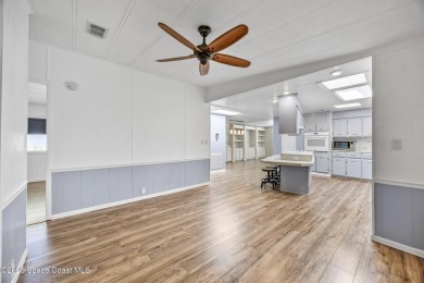 Beautiful updated manufactured home in Barefoot Bay. New roof in on Barefoot Bay Golf Course in Florida - for sale on GolfHomes.com, golf home, golf lot