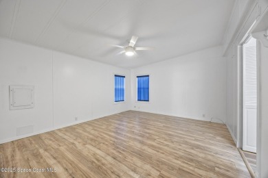 Beautiful updated manufactured home in Barefoot Bay. New roof in on Barefoot Bay Golf Course in Florida - for sale on GolfHomes.com, golf home, golf lot