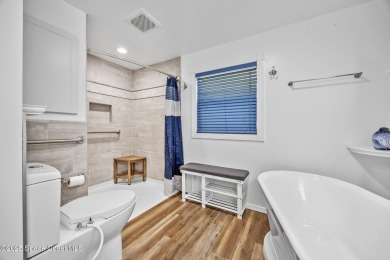 Beautiful updated manufactured home in Barefoot Bay. New roof in on Barefoot Bay Golf Course in Florida - for sale on GolfHomes.com, golf home, golf lot