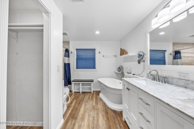 Beautiful updated manufactured home in Barefoot Bay. New roof in on Barefoot Bay Golf Course in Florida - for sale on GolfHomes.com, golf home, golf lot