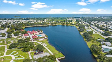 Beautiful updated manufactured home in Barefoot Bay. New roof in on Barefoot Bay Golf Course in Florida - for sale on GolfHomes.com, golf home, golf lot
