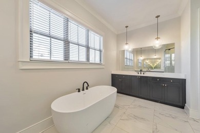 Welcome to this stunning 5 bedroom, 3.5 bathroom home in the on The Governors Towne Club in Georgia - for sale on GolfHomes.com, golf home, golf lot