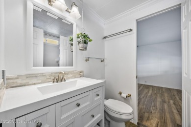 Beautiful updated manufactured home in Barefoot Bay. New roof in on Barefoot Bay Golf Course in Florida - for sale on GolfHomes.com, golf home, golf lot