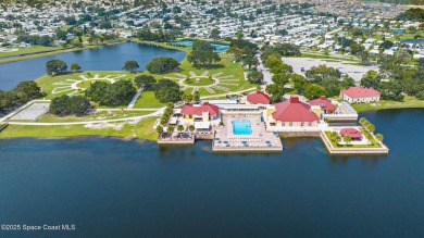 Beautiful updated manufactured home in Barefoot Bay. New roof in on Barefoot Bay Golf Course in Florida - for sale on GolfHomes.com, golf home, golf lot