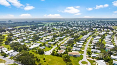 Beautiful updated manufactured home in Barefoot Bay. New roof in on Barefoot Bay Golf Course in Florida - for sale on GolfHomes.com, golf home, golf lot
