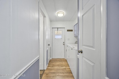Beautiful updated manufactured home in Barefoot Bay. New roof in on Barefoot Bay Golf Course in Florida - for sale on GolfHomes.com, golf home, golf lot