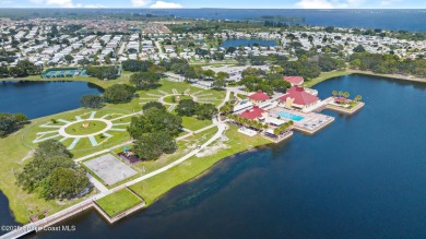 Beautiful updated manufactured home in Barefoot Bay. New roof in on Barefoot Bay Golf Course in Florida - for sale on GolfHomes.com, golf home, golf lot