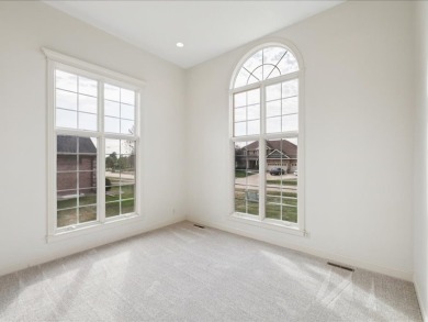 This spacious 4 bed, 4 bath home featuring over 4,000 sq ft is a on Otter Creek Golf Course in Iowa - for sale on GolfHomes.com, golf home, golf lot