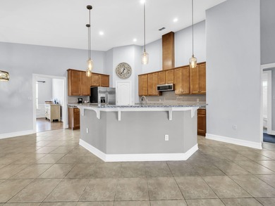 Beautiful all-brick home in a desirable golf course community on Windswept Dunes Golf Club in Florida - for sale on GolfHomes.com, golf home, golf lot