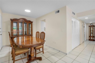 Move-in ready first-floor condo in sought-after Miami Lakes on Don Shulas Golf Course and Club in Florida - for sale on GolfHomes.com, golf home, golf lot