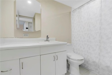 Move-in ready first-floor condo in sought-after Miami Lakes on Don Shulas Golf Course and Club in Florida - for sale on GolfHomes.com, golf home, golf lot