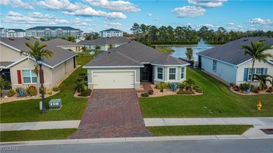 This charming 2019 well cared for 3/2 Eastham floorplan with on Sabal Springs Golf and Racquet Club in Florida - for sale on GolfHomes.com, golf home, golf lot