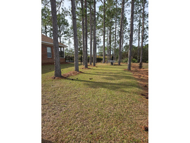 Beautiful all-brick home in a desirable golf course community on Windswept Dunes Golf Club in Florida - for sale on GolfHomes.com, golf home, golf lot