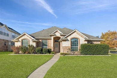 Welcome to this beautifully maintained 4-bedroom, 2.5-bath home on Mansfield National Golf Club in Texas - for sale on GolfHomes.com, golf home, golf lot