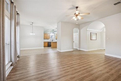 Welcome to this beautifully maintained 4-bedroom, 2.5-bath home on Mansfield National Golf Club in Texas - for sale on GolfHomes.com, golf home, golf lot