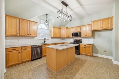 Welcome to this beautifully maintained 4-bedroom, 2.5-bath home on Mansfield National Golf Club in Texas - for sale on GolfHomes.com, golf home, golf lot