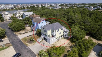 Discover your perfect Outer Banks summer retreat in this on The Currituck Golf Club in North Carolina - for sale on GolfHomes.com, golf home, golf lot