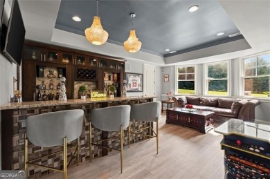 Experience luxury living at its finest at the highly sought on Manor Golf and Country Club in Georgia - for sale on GolfHomes.com, golf home, golf lot