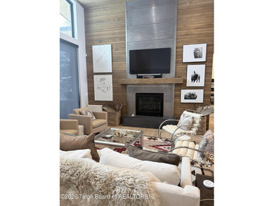 Discover mountain living at its finest at 15465 Tall Timber Rd on Snake River Sporting Club in Wyoming - for sale on GolfHomes.com, golf home, golf lot