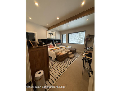 Discover mountain living at its finest at 15465 Tall Timber Rd on Snake River Sporting Club in Wyoming - for sale on GolfHomes.com, golf home, golf lot