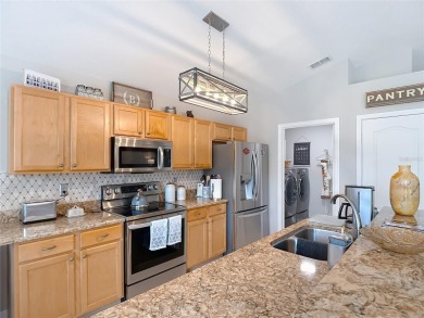 Welcome to this beautifully updated 3-bedroom plus office home on Lexington Oaks Golf Club in Florida - for sale on GolfHomes.com, golf home, golf lot