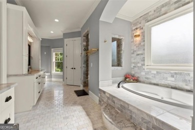 Experience luxury living at its finest at the highly sought on Manor Golf and Country Club in Georgia - for sale on GolfHomes.com, golf home, golf lot
