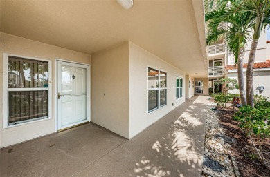 RARELY available 1st floor condo. Overlooking the intracoastal on Isla Del Sol Yacht and Country Club in Florida - for sale on GolfHomes.com, golf home, golf lot