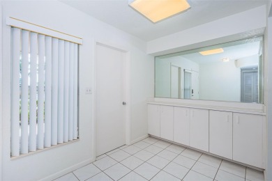 RARELY available 1st floor condo. Overlooking the intracoastal on Isla Del Sol Yacht and Country Club in Florida - for sale on GolfHomes.com, golf home, golf lot