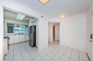 RARELY available 1st floor condo. Overlooking the intracoastal on Isla Del Sol Yacht and Country Club in Florida - for sale on GolfHomes.com, golf home, golf lot