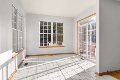 Discover the premier Sun Valley model-one of the most on Carillon Lakes 3 Hole Course in Illinois - for sale on GolfHomes.com, golf home, golf lot