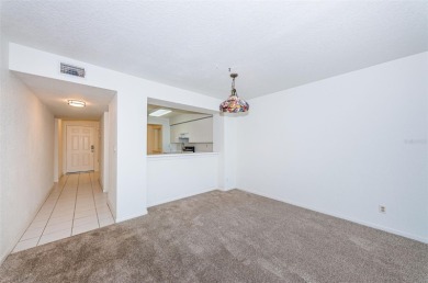 RARELY available 1st floor condo. Overlooking the intracoastal on Isla Del Sol Yacht and Country Club in Florida - for sale on GolfHomes.com, golf home, golf lot